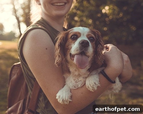 woman holding the dog she adopted